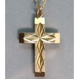 A 9ct. gold crucifix pendant on 9ct. fine-link chain necklet. (7 gm).