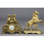 A 19th century gilt speltre figural mantel clock with white enamel dial & 8-day movement, 32cm