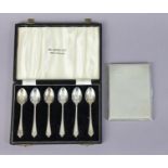 A silver engine-turned pocket cigarette case, Birmingham 1942 (5oz); & a set of six coffee spoons,