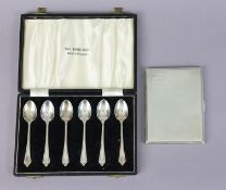 A silver engine-turned pocket cigarette case, Birmingham 1942 (5oz); & a set of six coffee spoons,
