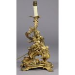 A 19th century French ormolu table lamp in the form of a putto holding flower garlands on rococo