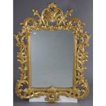 A reproduction rectangular wall mirror in gilt foliate frame, 120cm x 90cm.