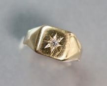 An un-marked yellow metal ring with gypsy-set small diamonds; size: P; 4.3 gm.