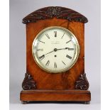 An early Victorian mahogany bracket clock, the 7¼” white enamel dial signed “J. TAYLOR, GRANTHAM”,