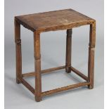 A late 19th/early 20th century Chinese hardwood occasional table with carved decoration, on square