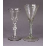 *Amended photos* An 18th century drinking glass with tall funnel bowl on airtwist stem, 17cm; & anot