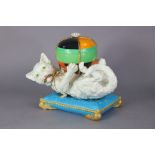 A William Brownfield model of a cat, playing with a brocaded ball forming a bowl & cover, laying
