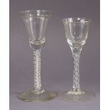 *Amended photos* An 18th century drinking glass with bell-shaped bowl, on opaque white twist stem