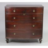 A 19th century mahogany bow-front chest fitted two short & three long graduated drawers with brass