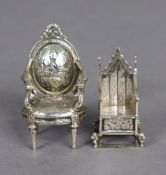 An Edwardian cast silver miniature model of the Medieval Coronation Chair, 2?” high, London 1901, by