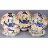 A 19th century Coalport part dessert service with rock & tree pattern in the Imari palette,