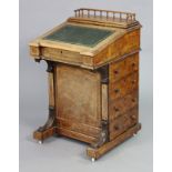 A mid-Victorian burr walnut davenport, with inlaid decoration, turned spindle gallery & satinwood