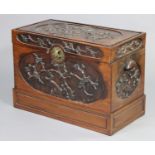 A late 19th/early 20th century Chinese carved hardwood trunk decorated to all sides with birds