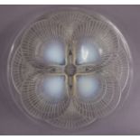 A LALIQUE OPALESCENT & CLEAR GLASS ‘COQUILLES’ PATTERN CIRCULAR DISH, with moulded shell design,