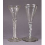 *Amended photos* An 18th century drinking glass with tall funnel bowl on opaque white twist stem wit