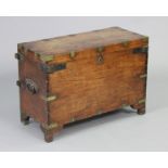 A late 19th century brass & iron bound teak campaign trunk with hinged lid & iron swing side