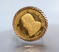 A 9ct. gold ring set 9ct. gold coin commemorating the life of Paul Kreuger (1825-1904); size: R/S;