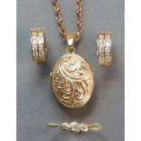 A 9ct. gold pendant oval photo. locket on gilt-metal chain necklace; a pair of yellow metal hoop