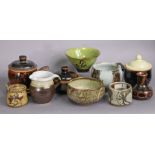 A collection of twelve items of studio pottery, including a green glazed “butterfly” bowl by Dora