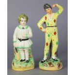 A 19th century Staffordshire pottery figure of a harlequin, & another of a cricketer, each stood