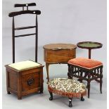 A walnut kidney-shaped needlework table with a hinged lift-lid, & on four slender cabriole legs &