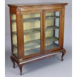A 19th century inlaid-mahogany china display cabinet fitted three shelves enclosed by a pair of