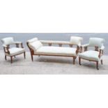 A Victorian carved walnut frame chaise longue upholstered multi-coloured floral material, & on short