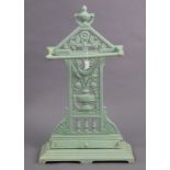 A Victorian pale green painted cast-iron umbrella stand with a pierced back plate, 16½” wide x 32”