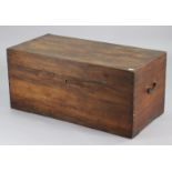 An early 20th century camphor wood trunk enclosed by a hinged lift-lid, & with brass side handles,