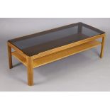 A Myer teak rectangular two-tier coffee table, 43” wide x 13¾” high; & a pair of white-finish