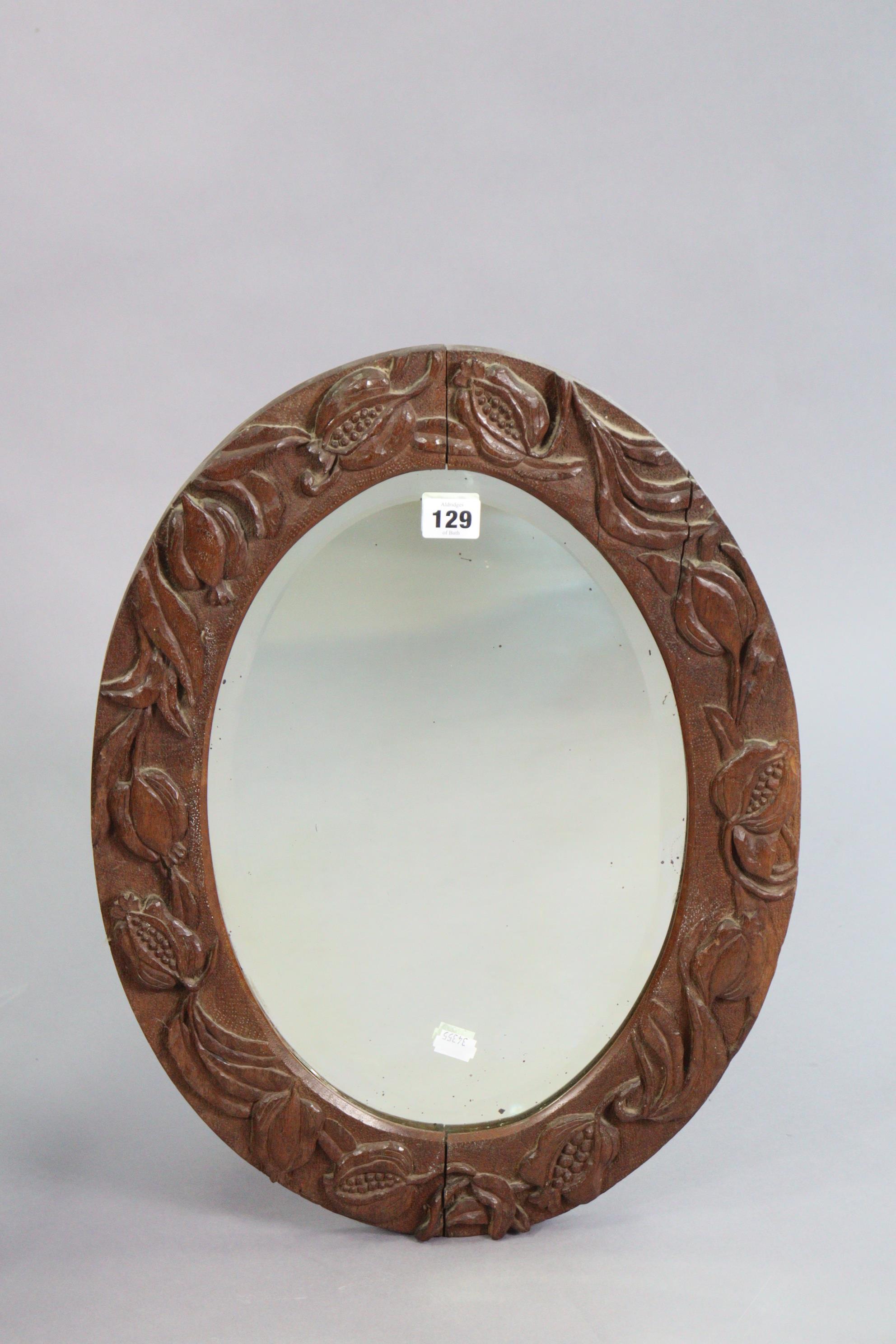 A carved wooden oval wall mirror inset with a bevelled plate, 21” x 15¼”; together with a three-tier - Image 2 of 5