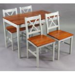 A pine kitchen table with a rectangular top, the off-white underside on four square legs, 42½”