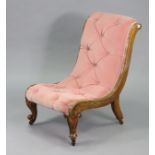 A Victorian slipper chair with a buttoned all-in-one scroll seat & back upholstered rose-pink velour