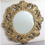 A 19th century-style large gilt-frame circular wall mirror 39” diameter.