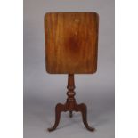 A 19th century mahogany tripod table with rounded corners to the rectangular tilt-top, 16¾” wide x