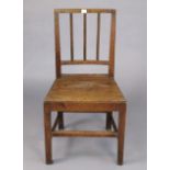 An early 20th century cottage dining chair with a hard seat, & on square tapered legs with plain