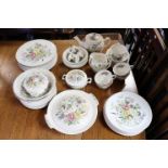 A Johnson Bros Windsor ware “Garden Bouquet” sixty-one piece extensive part dinner & tea