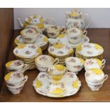 A Royal Paragon floral decorated extensive sixty-two piece part tea & coffee service, part w.a.f.