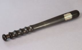An early 20th century ebonised wooden truncheon with applied shield-shaped metal plaque “CITY OF