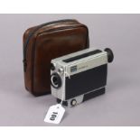 A vintage Kodak M24 Instamatic movie camera, with case.