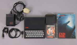 A Sinclair “Zx81” home computer (circa. 1980s) with various accessories.