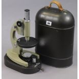 A 1970’s Russian monocular field microscope, with case.