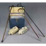 Two vintage stoneware foot-warmers; two walking canes; a shooting-stick; & various records.