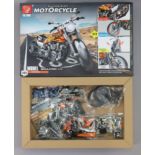 A TLG Building Block Motorcycle Construction Kit, boxed.