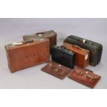 Five vintage suitcases; two ditto holdalls; & two satchels.