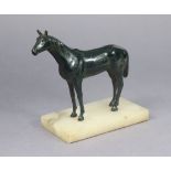 A spelter model of a standing horse mounted on an onyx plinth, 17.5cm wide x 16.5cm high.