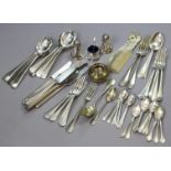 A quantity of plated flatware & cutlery; a condiment set; a brass & red enamel travelling