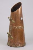 An Edwardian copper riveted coal hod of round tapered form & with brass side handles, 55cm high.