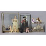 Two Queen Elizabeth II dolls, each in a glazed case; together with eight various other dolls &