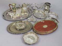A silver plated oval two-handled tea-tray with a gadrooned border, 60.5cm x 42cm; another wooden